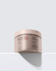 BODiQ Science of Renovation Perfecting Night Body Cream – noční tělový krém na světle šedém pozadí