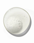Transparent gel with bubbles representing deep cleansing properties of Authentic Beauty Concept shampoo.