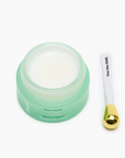 Rare Paris Elixir Intense Eye Serum in green jar with application spatula, designed for nourishing eye care.