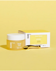 Rare Paris Trésor Solaire Day Cream jar and box on a bright yellow background, featuring soothing ingredients for sensitive skin.