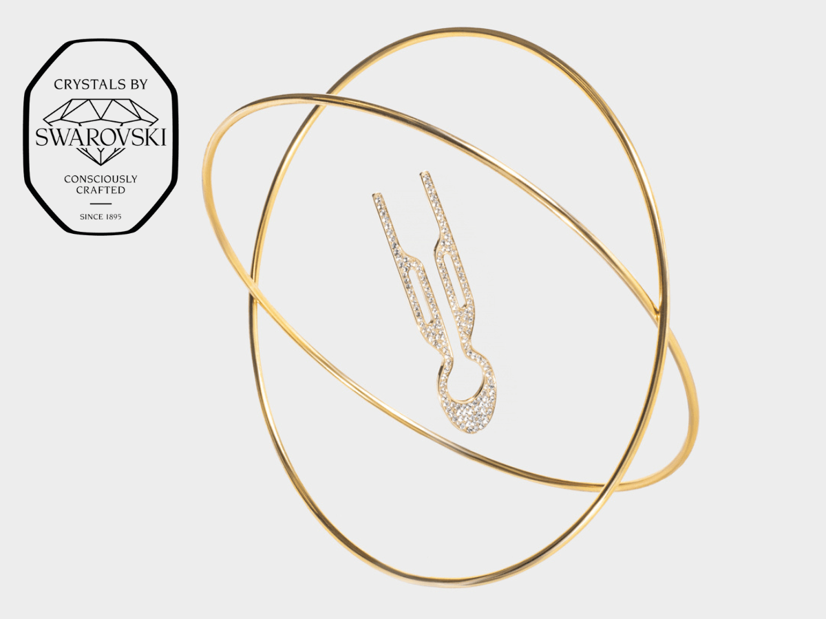 Fiona Franchimon Nº1 HAIRPIN Steel with Swarovski® Crystals | Yellow Gold Finish elegantly displayed with Swarovski branding.
