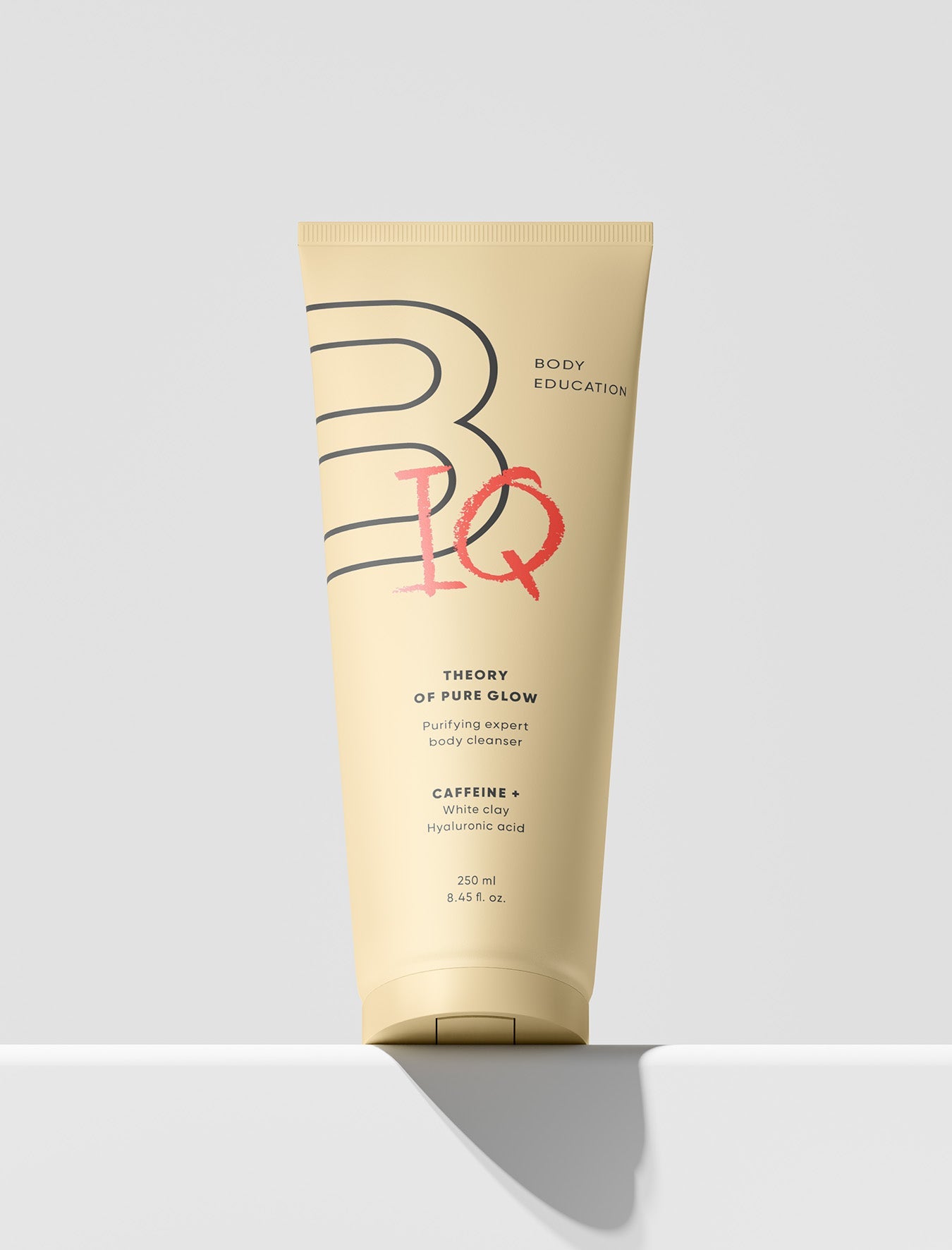 Tube of body wash with 'Body Education' branding on a light gray background