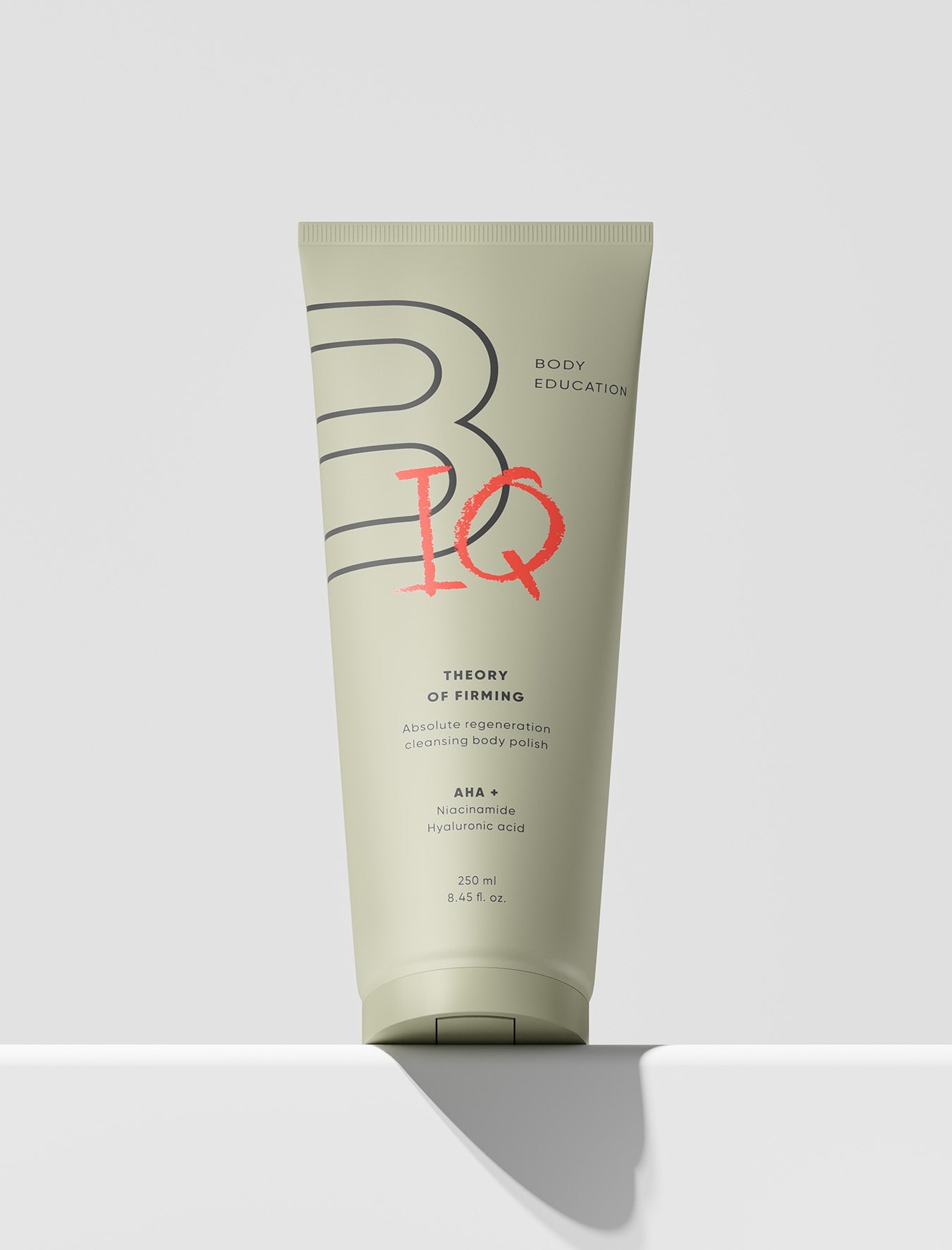 Tube of body lotion with BODIQ branding on a white background