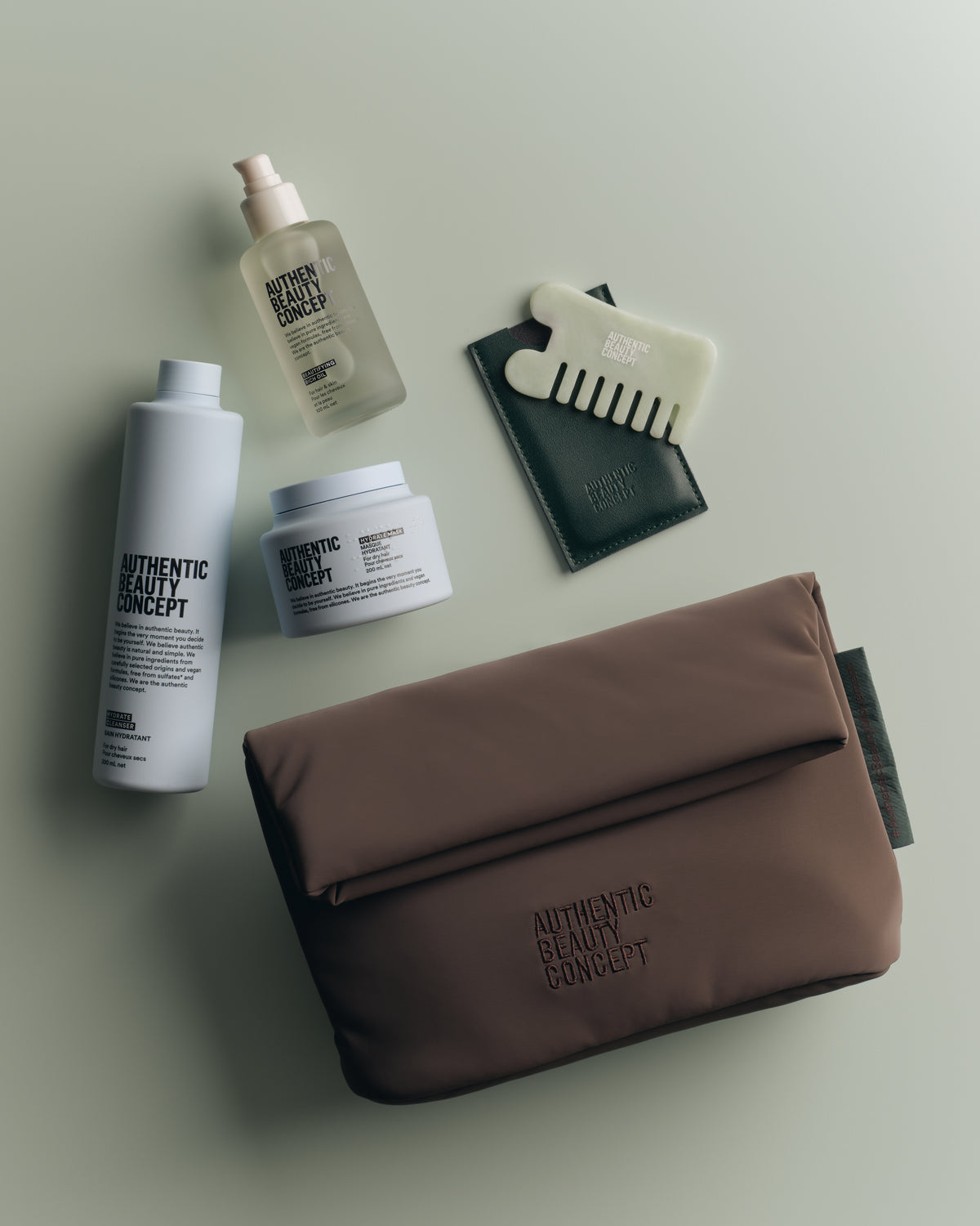 AUTHENTIC BEAUTY CONCEPT Wellness Pack – Hydrate péče, olej, jadeitový hřeben a kosmetická taštička
