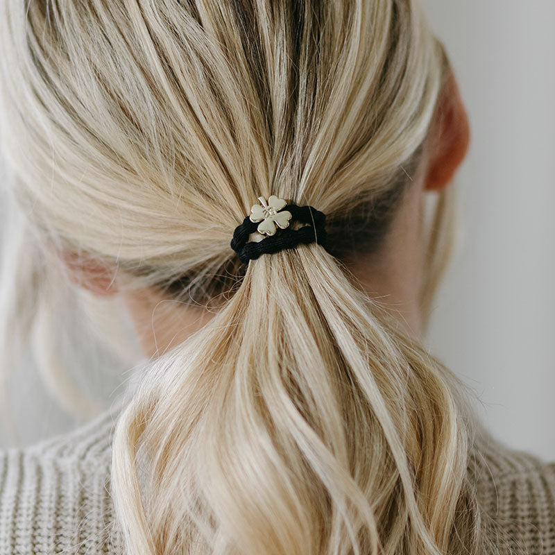 gold clover leaf black