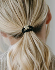 gold clover leaf black