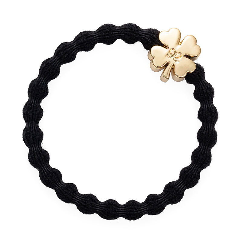 gold clover leaf black