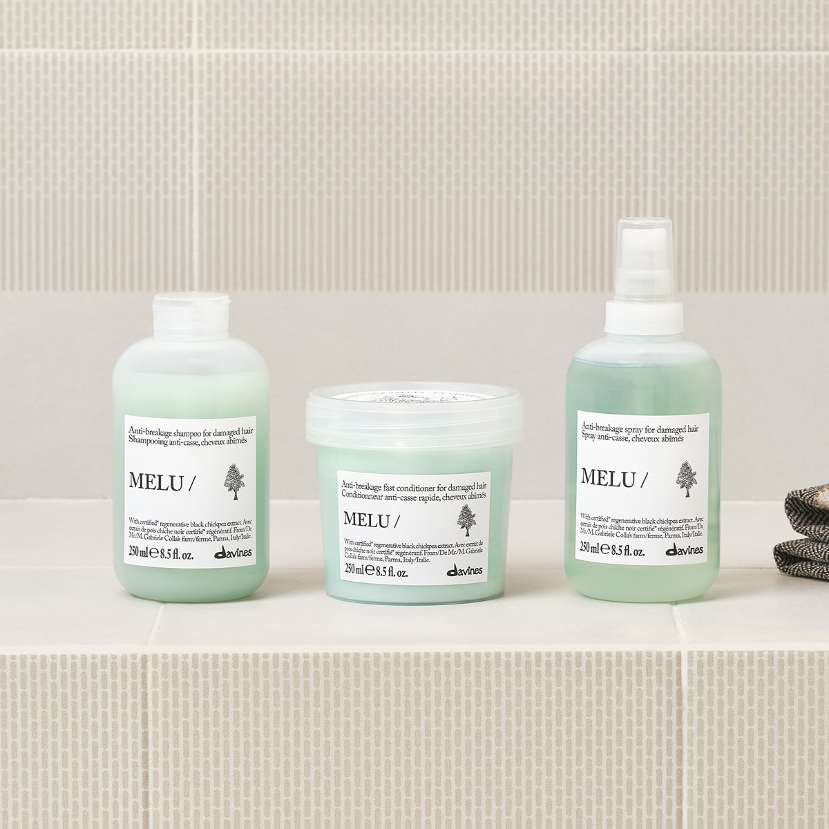 Davines-70008-MELU-SPRAY-250ML-8004608290346-SITUATIONAL-1.jpg