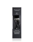 RevitaLash Signature Eyelash Curler Kleštičky na řasy in packaging, designed for perfect eyelash curling.