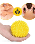 Masážní míček s bodlinkami 10cm - žlutý